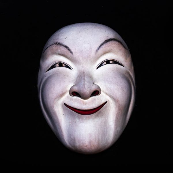 Happy Person carved and signed by Ida Bagus Anom